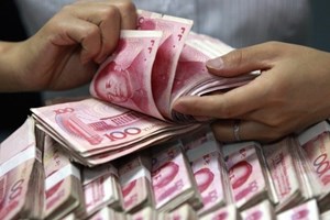 Cina, giù produzione e investimenti ma salgono i consumi