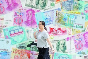 Cina, segnali contrastanti, male l'immobiliare, bene la produzione